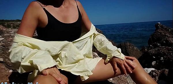  little bitch teases with oil and fucks pussy with cock on public beach outside